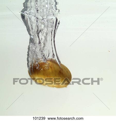 Stock Photo - Close-up of potato splashing in water . Fotosearch