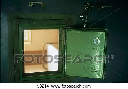 Picture - Close-up of prison cell flap . Fotosearch
