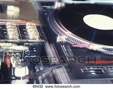 Stock Image - Close-up of record on turntable . Fotosearch