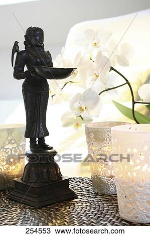 Close-up of statue and lamps View Large Photo Image Stock Image - Close-up of statue and lamps . Fotosearch