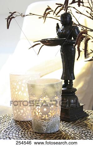 Close-up of statue and lamps View Large Photo Image Stock Photograph - Close-up of statue and lamps . Fotosearch