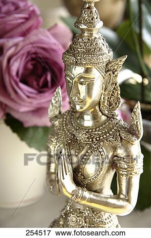 Stock Photo - Close-up of statue of Buddha . Fotosearch