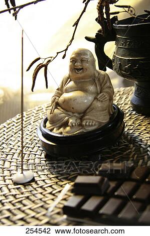 Close-up of statue of laughing Buddha View Large Photo Image Stock Image - Close-up of statue of laughing Buddha . Fotosearch