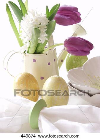 Close-up of tulip flowers and Easter eggs View Large Photo Image Picture - Close-up of tulip flowers and Easter eggs . Fotosearch