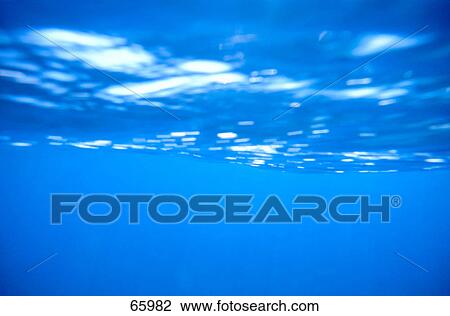 Close-up of water surface background View Large Photo Image Stock Image - Close-up of water surface background . Fotosearch