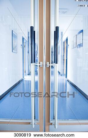 Stock Photo - Closed door of an office corridor, close-up . Fotosearch