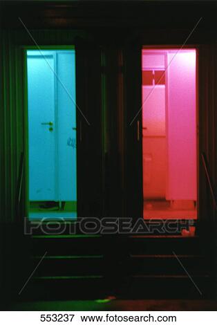 Stock Photo - Closed door viewed from window glass . Fotosearch