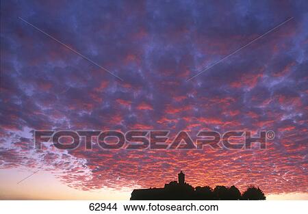 Picture - Clouds in sky at dusk, Hessen, Germany, Europe . Fotosearch