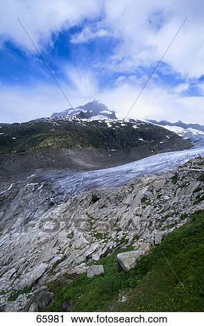Clouds over mountain, Rhone Glacier, Valais, Switzerland View Large Photo Image Stock Image - Clouds over mountain, Rhone Glacier, Valais, Switzerland . Fotosearch