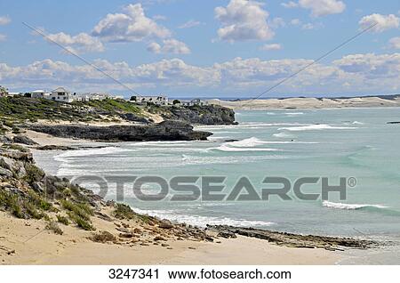 Stock Image - Coast of Arniston, buildings in the background, Republic of South Africa . Fotosearch
