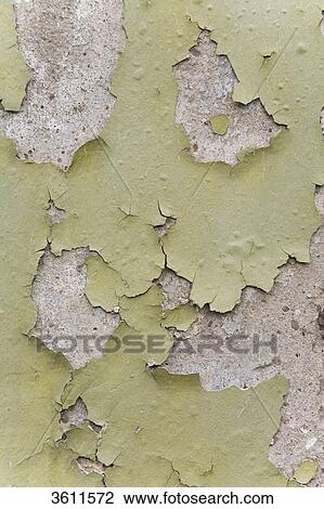 Stock Image - Colour crumbling from wall . Fotosearch