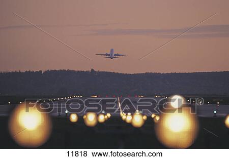 Commercial aircraft taking off View Large Photo Image Stock Photo - Commercial aircraft taking off . Fotosearch