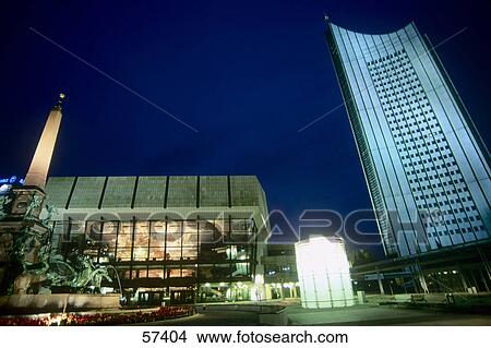 Picture - Concert house and skyscraper lit up at night, Gewandhaus, University Tower, Augustusplatz, Leipzig, Saxony, Germany . Fotosearch