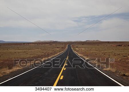Country road in Arizona, USA, vanishing point View Large Photo Image Stock Photo - Country road in Arizona, USA, vanishing point . Fotosearch
