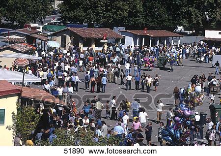 Crowd of people at town centre during festival, Asti, Piedmont, Italy View Large Photo Image Stock Image - Crowd of people at town centre during festival, Asti, Piedmont, Italy . Fotosearch