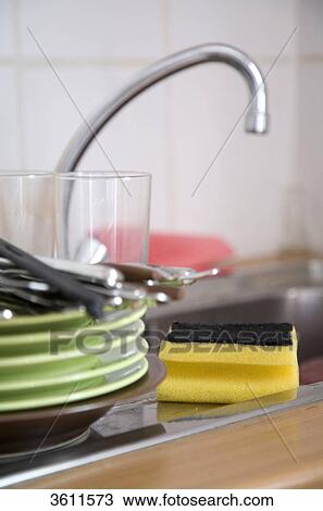 Dirty dishes on a sink View Large Photo Image Stock Image - Dirty dishes on a sink . Fotosearch