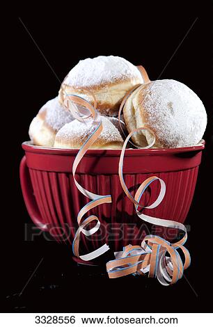 Doughnuts in a bowl, close-up View Large Photo Image Stock Photograph - Doughnuts in a bowl, close-up . Fotosearch