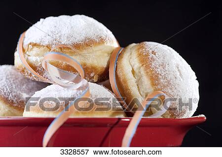 Doughnuts in a bowl, detail View Large Photo Image Stock Photo - Doughnuts in a bowl, detail . Fotosearch