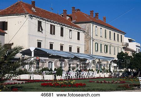 Formal garden in front of houses, Zadar, Croatia View Large Photo Image Stock Image - Formal garden in front of houses, Zadar, Croatia . Fotosearch