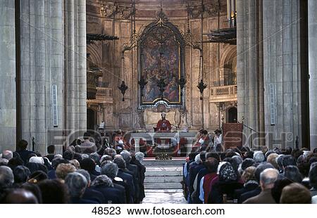 Stock Image - Group of people in church, Lisbon, Portugal . Fotosearch