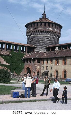 Group of tourists standing in front of building, Lombardia, Milano, Italy, Europe View Large Photo Image Stock Photography - Group of tourists standing in front of building, Lombardia, Milano, Italy, Europe . Fotosearch