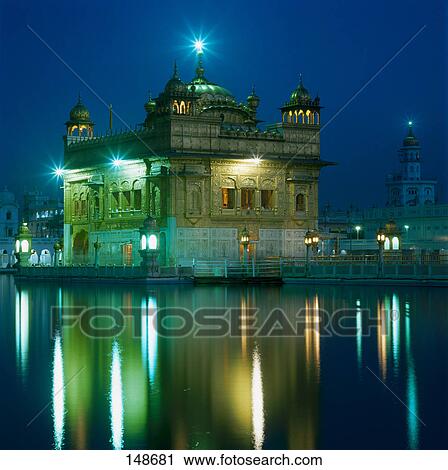 Stock Image - Gurdwara lit up at night, Harmandir Sahib, Amrit Sovar, Amritsar, Punjab . Fotosearch