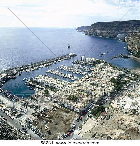 Stock Image - High angle view of a marina, Puerto de Mogan, Gran Canaria, Canary Islands, Spain . Fotosearch