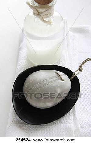 Picture - High angle view of bar of soap in soap dish . Fotosearch