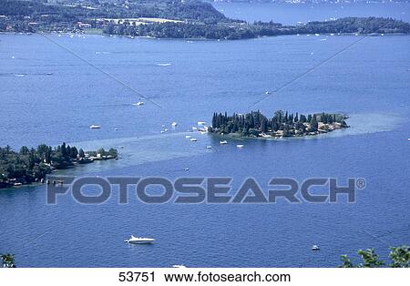 High angle view of boats in sea, Rocca di Manerba, Lake Garda, Lombardy, Italy View Large Photo Image Stock Image - High angle view of boats in sea, Rocca di Manerba, Lake Garda, Lombardy, Italy . Fotosearch