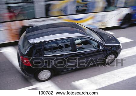High angle view of car and bus in motion on road, Barcelona, Spain View Large Photo Image Stock Image - High angle view of car and bus in motion on road, Barcelona, Spain . Fotosearch