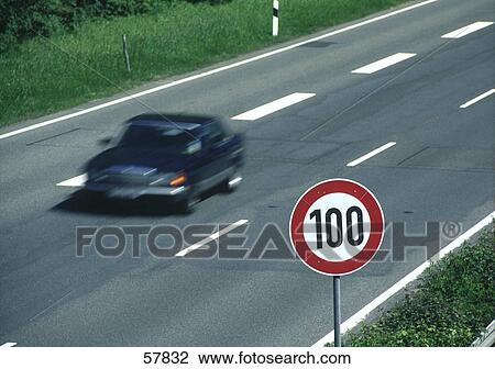 High angle view of car on highway with speed limit sign at roadside View Large Photo Image Stock Image - High angle view of car on highway with speed limit sign at roadside . Fotosearch