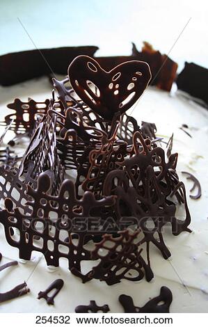 Stock Image - High angle view of chocolate cake . Fotosearch
