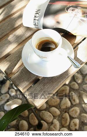 High angle view of cup of black coffee View Large Photo Image Stock Image - High angle view of cup of black coffee . Fotosearch