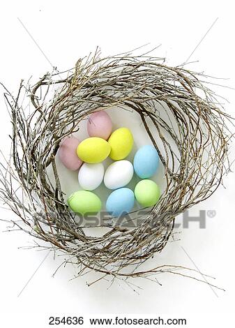 High angle view of Easter eggs in nest View Large Photo Image Stock Photograph - High angle view of Easter eggs in nest . Fotosearch