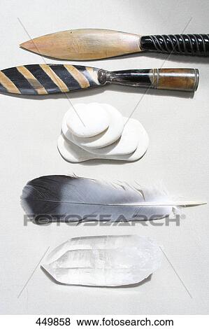 High angle view of feather and stack of pebbles View Large Photo Image Stock Photo - High angle view of feather and stack of pebbles . Fotosearch