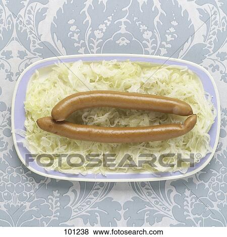 High angle view of sausages and cabbage on plate View Large Photo Image Stock Photo - High angle view of sausages and cabbage on plate . Fotosearch
