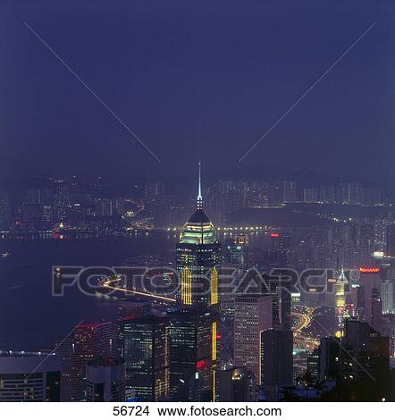 Picture - High angle view of skyscrapers illuminated at night, Hong Kong, China, Asia . Fotosearch