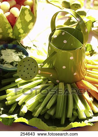 High angle view of watering can on salad View Large Photo Image Stock Image - High angle view of watering can on salad . Fotosearch