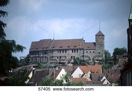 Stock Photography - Houses in front of castle, Nuremberg Castle, Nuremberg, Bavaria, Germany . Fotosearch