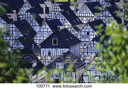 Houses in town viewed through plants, Freudenberg, Germany View Large Photo Image Stock Image - Houses in town viewed through plants, Freudenberg, Germany . Fotosearch