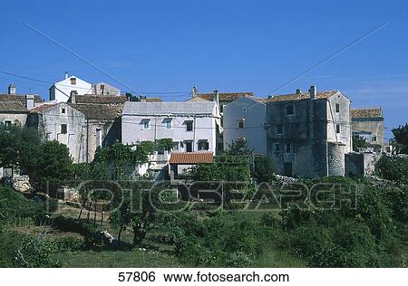 Stock Photograph - Houses in village, Cres Island, Croatia . Fotosearch