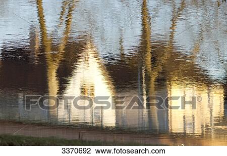 Stock Image - Houses reflectet in water, Gaggenau, Germany, view upon . Fotosearch