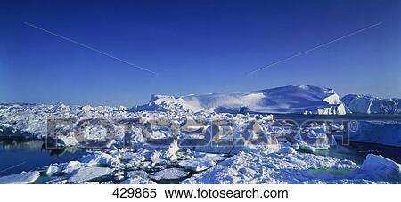 Stock Photography - Icebergs floating on water in fjord . Fotosearch