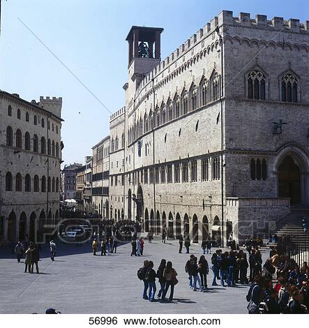 Stock Photograph - Large group of people walking in front of palace, Perugia, Umbria, Italy, Europe . Fotosearch