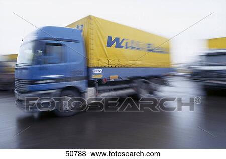 Stock Photo - Lorry in motion on road . Fotosearch