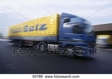 Stock Photo - Lorry in motion on road . Fotosearch