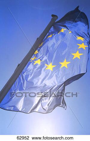 Stock Image - Low angle view of European Union flag . Fotosearch