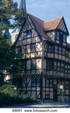 Stock Image - Low angle view of half-timbered old town hall, Quedlinburg, Harz, Saxony-Anhalt, Germany . Fotosearch
