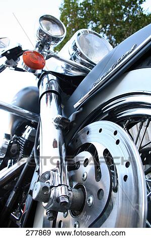 Stock Photo - Low angle view of motorcycle . Fotosearch