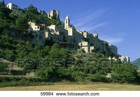 Picture - Low angle view of village, Montbrun-les-Bains, Drome, France, Europe . Fotosearch
